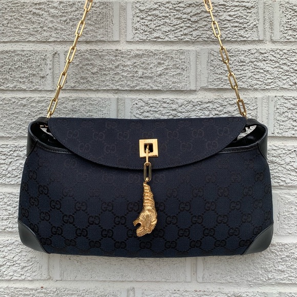 gucci purse with lion head